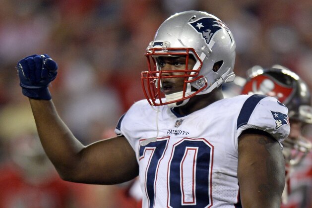 New England Patriots defensive tackle Adam Butler pumps his fist after the Tampa Bay Buccaneers missed a field goal during the second half of an NFL football game, Thursday, Oct. 5, 2017, in Tampa, Fla. (AP Photo/Jason Behnken)