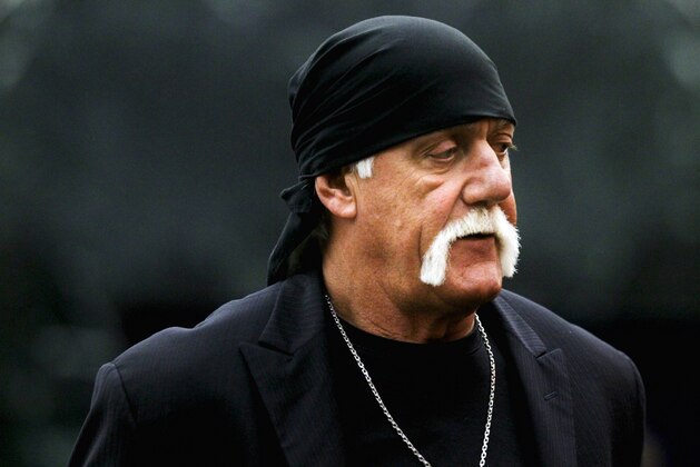 Hulk Hogan arrives before the start of his trial Thursday, March 17, 2016, in St. Petersburg, Fla. Hogan, whose given name is Terry Bollea, and his attorneys are suing Gawker Media for $100 million, saying his privacy was violated, and he suffered emotional distress after Gawker posted a sex tape of Hogan and his then-best friend's wife. (Dirk Shadd/The Tampa Bay Times via AP, Pool)