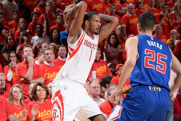HOUSTON, TX - MAY 17:  Trevor Ariza #1 of the Houston Rockets handles the ball against Austin Rivers #25 of the Los Angeles Clippers in Game Seven of the Western Conference Semifinals during the 2015 NBA Playoffs on May 17, 2015 at the Toyota Center in Houston, Texas. NOTE TO USER: User expressly acknowledges and agrees that, by downloading and or using this photograph, User is consenting to the terms and conditions of the Getty Images License Agreement. Mandatory Copyright Notice: Copyright 2015 NBAE (Photo by Andrew D. Bernstein/NBAE via Getty Images)