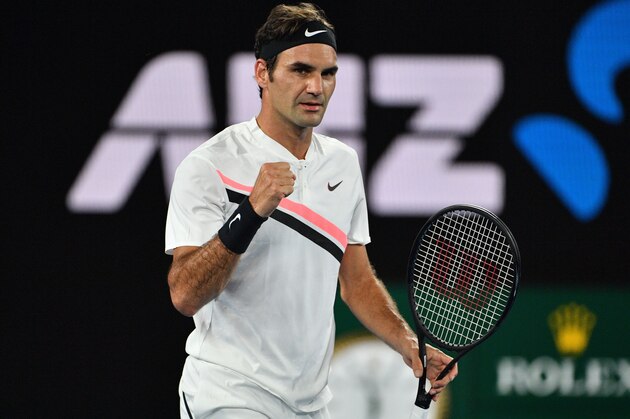 Switzerland's Roger Federer reacts after beating Germany's Jan-Lennard Struff in their men's singles second round match on day four of the Australian Open tennis tournament in Melbourne on January 18, 2018. / AFP PHOTO / SAEED KHAN / -- IMAGE RESTRICTED TO EDITORIAL USE - STRICTLY NO COMMERCIAL USE --        (Photo credit should read SAEED KHAN/AFP/Getty Images)
