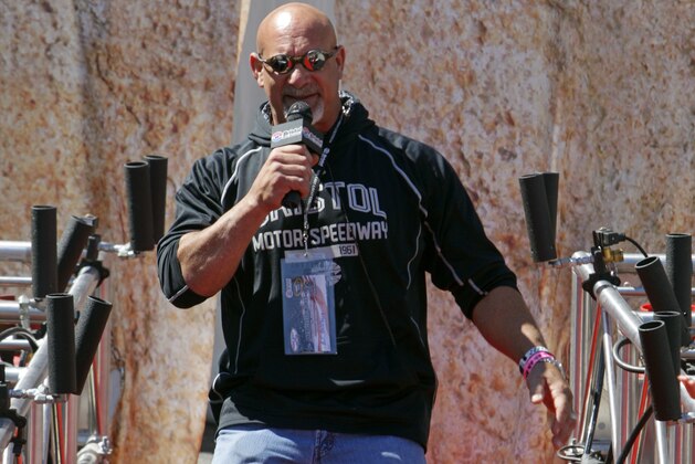 Retired professional wrestler and actor, Bill Goldberg walks down the red carpet to make driver introductions before a NASCAR Sprint Cup Series auto race, Sunday, April 17, 2016 in Bristol, Tenn. (AP Photo/Wade Payne)