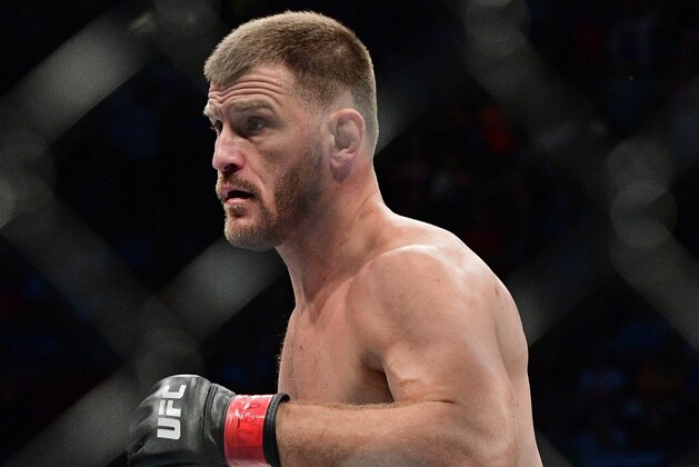 Stipe Miocic in action against Alistair Overeem during a heavyweight title bout at UFC 203 on Saturday, Sept. 10, 2016, in Cleveland. Stipe Miocic won via knock out. (AP Photo/David Dermer)