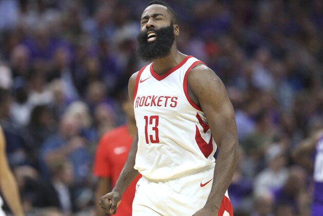 Houston Rockets guard James Harden reacts after scoring against the Sacramento Kings during the second half of an NBA basketball game in Sacramento, Calif., Wednesday, Oct. 18, 2017. The Rockets won 105-100.(AP Photo/Steve Yeater)