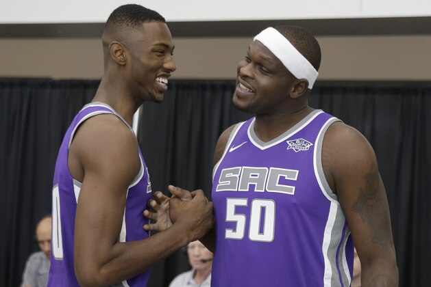 Sacramento Kings rookie forward Harry Giles, left, jokes with Zach Randolph during the NBA basketball team's media day Monday, Sept. 25, 2017, in Sacramento, Calif. (AP Photo/Rich Pedroncelli)