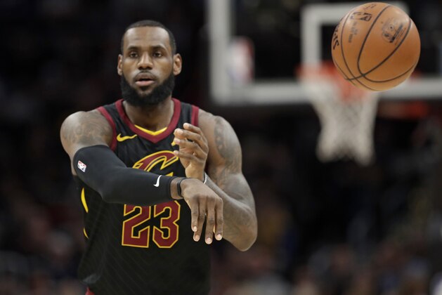 Cleveland Cavaliers' LeBron James passes in the first half of an NBA basketball game against the Golden State Warriors, Monday, Jan. 15, 2018, in Cleveland. (AP Photo/Tony Dejak)