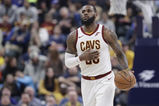 Cleveland Cavaliers' LeBron James dribbles during the first half of an NBA basketball game against the Indiana Pacers, Friday, Jan. 12, 2018, in Indianapolis. (AP Photo/Darron Cummings)