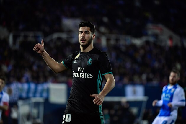 Real Madrid's Spanish forward Marco Asensio gestures during the Spanish 'Copa del Rey' (King's cup) football match between Leganes and Real Madrid at the Estadio Municipal Butarque in Leganes on January 18, 2018. / AFP PHOTO / OSCAR DEL POZO        (Photo credit should read OSCAR DEL POZO/AFP/Getty Images)