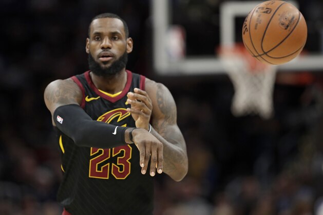 Cleveland Cavaliers' LeBron James passes in the first half of an NBA basketball game against the Golden State Warriors, Monday, Jan. 15, 2018, in Cleveland. (AP Photo/Tony Dejak)