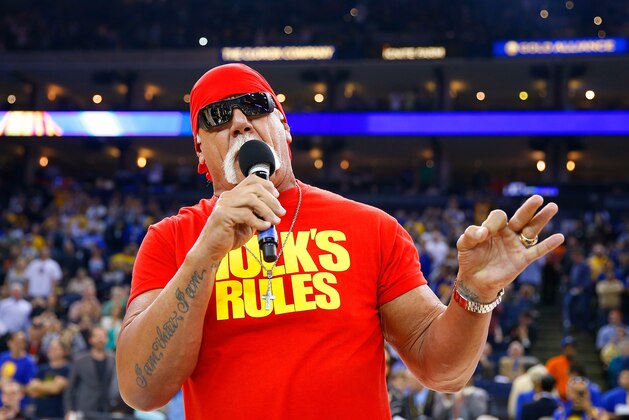 OAKLAND, CA - NOVEMBER 13:  Hulk Hogan pumps of the Warriors fans before the start of an NBA basketball game between the Brooklyn Nets and the Golden State Warriors at ORACLE Arena on November 13, 2014 in Oakland, California. NOTE TO USER: User expressly acknowledges and agrees that, by downloading and or using this photograph, User is consenting to the terms and conditions of the Getty Images License Agreement.  (Photo by Thearon W. Henderson/Getty Images)