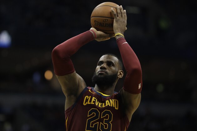 Cleveland Cavaliers' LeBron James shoots during the first half of an NBA basketball game against the Milwaukee Bucks Tuesday, Dec. 19, 2017, in Milwaukee. (AP Photo/Morry Gash)