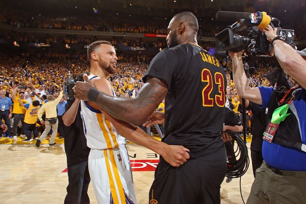 OAKLAND, CA - JUNE 12:  Stephen Curry #30 of the Golden State Warriors and LeBron James #23 of the Cleveland Cavaliers talk after Game Five of the 2017 NBA Finals on June 12, 2017 at Oracle Arena in Oakland, California. NOTE TO USER: User expressly acknowledges and agrees that, by downloading and or using this photograph, user is consenting to the terms and conditions of Getty Images License Agreement. Mandatory Copyright Notice: Copyright 2017 NBAE (Photo by Nathaniel S. Butler/NBAE via Getty Images)