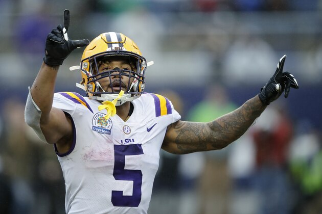 3ORLANDO, FL - JANUARY 01: Derrius Guice #5 of the LSU Tigers reacts after a two-yard reception for touchdown against the Notre Dame Fighting Irish in the fourth quarter of the Citrus Bowl on January 1, 2018 in Orlando, Florida. Notre Dame won 21-17. (Photo by Joe Robbins/Getty Images)