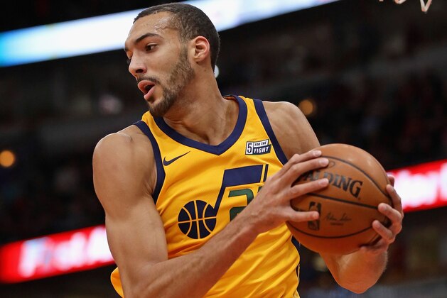 CHICAGO, IL - DECEMBER 13:   Rudy Gobert #27 of the Utah Jazz rebounds against the Chicago Bulls at the United Center on December 13, 2017 in Chicago, Illinois. The Bulls defeated the Jazz 103-100. NOTE TO USER: User expressly acknowledges and agrees that, by downloading and or using this photograph, User is consenting to the terms and conditions of the Getty Images License Agreement. (Photo by Jonathan Daniel/Getty Images)