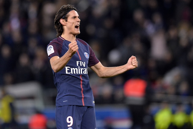 PARIS, FRANCE - JANUARY 17:  Edinson Cavani of Paris Saint-Germain reacts after scoring which made him tie up the all time club history top scorer during the Ligue 1 match between Paris Saint Germain and Dijon FCO at Parc des Princes on January 17, 2018 in Paris.  (Photo by Aurelien Meunier/Getty Images )