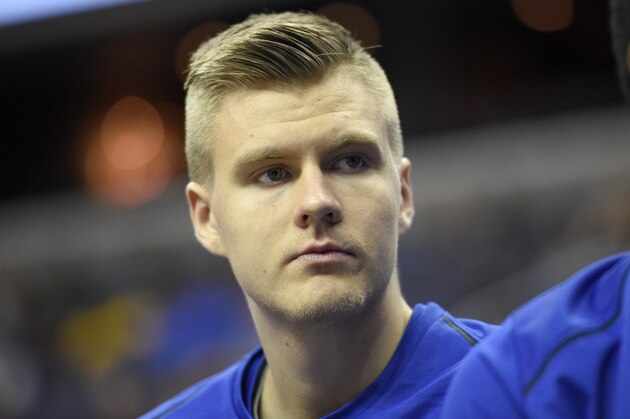 New York Knicks forward Kristaps Porzingis, of Latvia, looks on during the first half of an preseason NBA basketball game against the Washington Wizards, Friday, Oct. 6, 2017, in Washington. (AP Photo/Nick Wass)