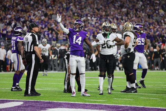 MINNEAPOLIS, MN - JANUARY 14:  Stefon Diggs #14 of the Minnesota Vikings celebrates a gain during the second quarter of the NFC Divisional Playoff game  against the New Orleans Saints on January 14, 2018 at U.S. Bank Stadium in Minneapolis, Minnesota. (Photo by Adam Bettcher/Getty Images)