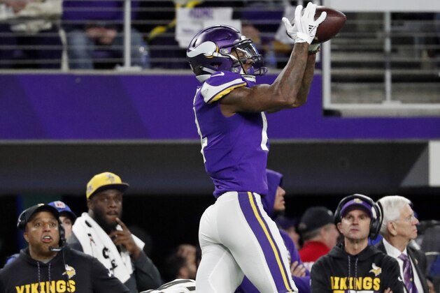 Minnesota Vikings wide receiver Stefon Diggs (14) makes a catch over New Orleans Saints free safety Marcus Williams (43) on his way to the game winning touchdown during the second half of an NFL divisional football playoff game in Minneapolis, Sunday, Jan. 14, 2018. The Vikings defeated the Saints 29-24. (AP Photo/Jeff Roberson)