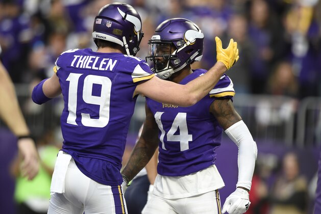 MINNEAPOLIS, MN - DECEMBER 31: Stefon Diggs #14 of the Minnesota Vikings celebrates with teammate Adam Thielen #19 after scoring a touchdown in the third quarter of the game against the Chicago Bears on December 31, 2017 at U.S. Bank Stadium in Minneapolis, Minnesota. (Photo by Hannah Foslien/Getty Images)