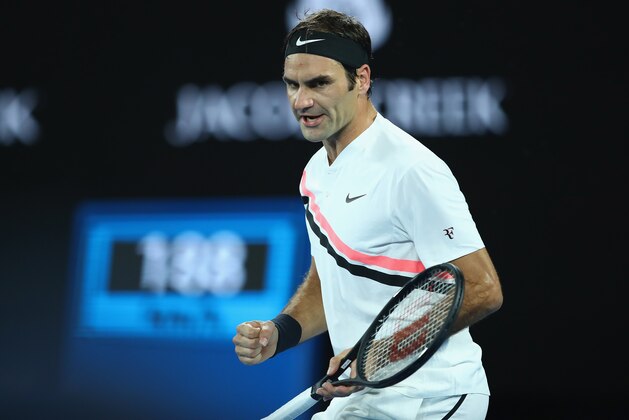 MELBOURNE, AUSTRALIA - JANUARY 20:  Roger Federer of Switzerland celebrates a point in his third round match against Richard Gasquet of France on day six of the 2018 Australian Open at Melbourne Park on January 20, 2018 in Melbourne, Australia.  (Photo by Clive Brunskill/Getty Images)