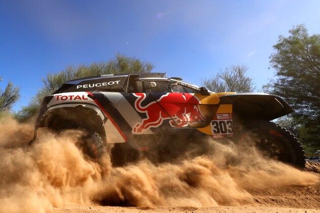 UNSPECIFIED, ARGENTINA - JANUARY 19:  Carlos Sainz of Spain and Peugeot Total drives with co-driver Lucas Cruz of Spain in the 3008 DKR Peugeot car in the Classe : T1.4 2 Roues Motrices, Diesel during stage thirteen of the 2018 Dakar Rally between San Juan and Cordoba on January 19, 2018 in UNSPECIFIED, Argentina.  (Photo by Dan Istitene/Getty Images)