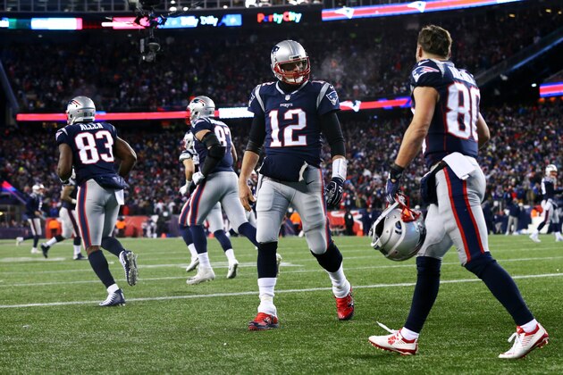 FOXBOROUGH, MA - JANUARY 13: Tom Brady #12 of the New England Patriots celebrates with Danny Amendola #80 during the AFC Divisional Playoff game against the Tennessee Titans at Gillette Stadium on January 13, 2018 in Foxborough, Massachusetts. (Photo by Maddie Meyer/Getty Images)