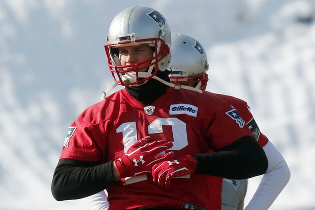 New England Patriots quarterback Tom Brady warms up during an NFL football practice, Friday, Jan. 19, 2018, in Foxborough, Mass. The Patriots host the Jacksonville Jaguars in the AFC championship on Sunday in Foxborough.(AP Photo/Bill Sikes)