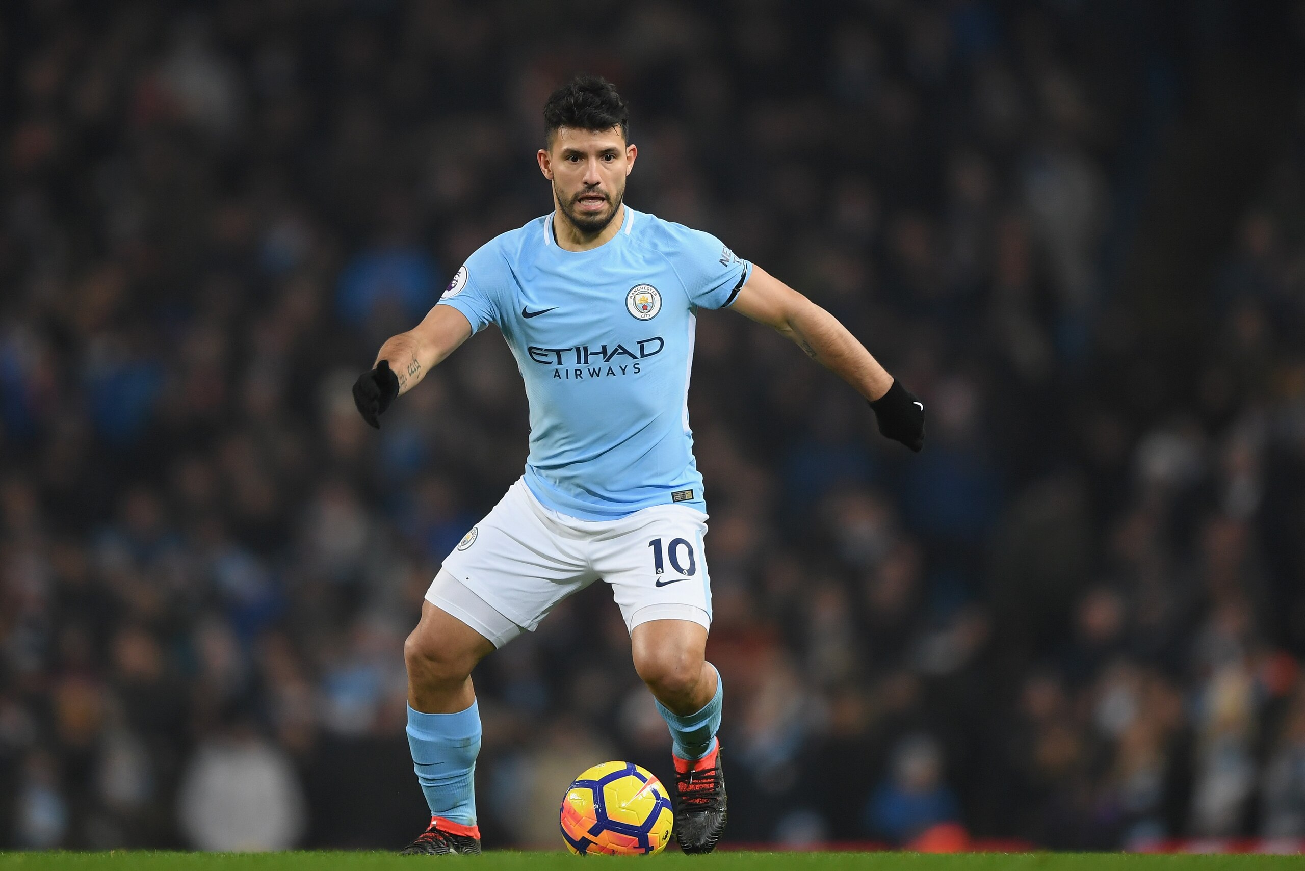 MANCHESTER, ENGLAND - JANUARY 20:  Sergio Aguero of Manchester City runs with the ball during the Premier League match between Manchester City and Newcastle United at Etihad Stadium on January 20, 2018 in Manchester, England.  (Photo by Shaun Botterill/Getty Images)