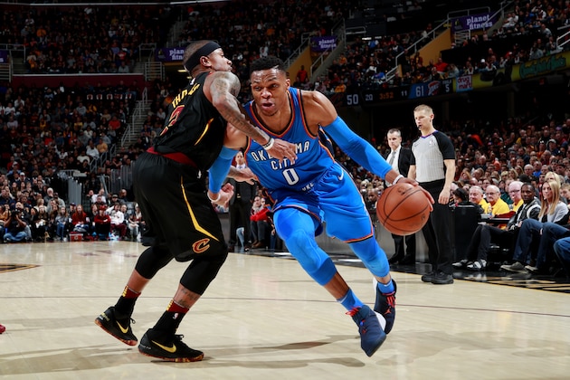 CLEVELAND, OH - JANUARY 20: Russell Westbrook #0 of the Oklahoma City Thunder handles the ball during the game against the Cleveland Cavaliers on January 20, 2018 at Quicken Loans Arena in Cleveland, Ohio. NOTE TO USER: User expressly acknowledges and agrees that, by downloading and/or using this Photograph, user is consenting to the terms and conditions of the Getty Images License Agreement. Mandatory Copyright Notice: Copyright 2018 NBAE (Photo by Jeff Haynes/NBAE via Getty Images)