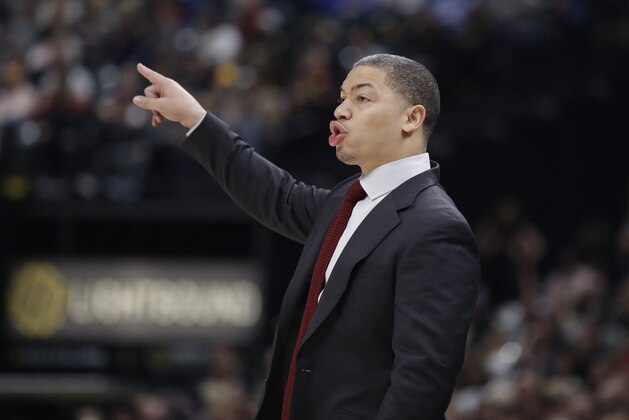 Cleveland Cavaliers head coach Tyronn Lue calls a play during the second half of an NBA basketball game against the Indiana Pacers, Friday, Jan. 12, 2018, in Indianapolis. Indiana won 97-95. (AP Photo/Darron Cummings)