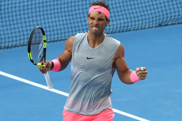 MELBOURNE, AUSTRALIA - JANUARY 21:  Rafael Nadal of Spain celebrates winning a point in his fourth round match against Diego Schwartzman of Argentina on day seven of the 2018 Australian Open at Melbourne Park on January 21, 2018 in Melbourne, Australia.  (Photo by Cameron Spencer/Getty Images)