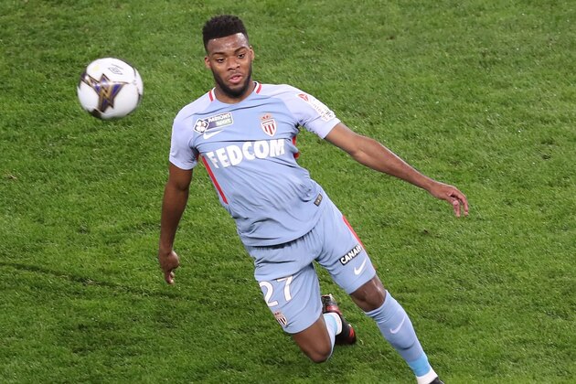 Monaco's French midfielder Thomas Lemar (L) fights for the ball with Nice's Ivorian midfielder Jean Michael Seri (R) during the French League Cup football match between Nice and Monaco at The 'Allianz Riviera' Stadium in Nice on January 9, 2018.   / AFP PHOTO / VALERY HACHE        (Photo credit should read VALERY HACHE/AFP/Getty Images)