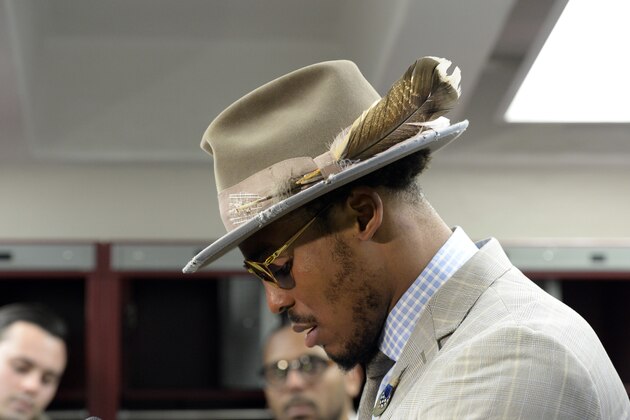 Carolina Panthers quarterback Cam Newton talks to reporters after an NFL wild card playoff football game against the New Orleans Saints in New Orleans, Sunday, Jan. 7, 2018. The Saints won 36-21. (AP Photo/Bill Feig)