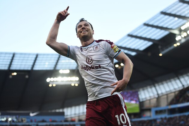 Burnley's English striker Ashley Barnes celebrates scoring the opening goal during the English FA Cup third round football match between Manchester City and Burnley at Etihad Stadium in Manchester, north west England on January 6, 2018. / AFP PHOTO / Oli SCARFF / RESTRICTED TO EDITORIAL USE. No use with unauthorized audio, video, data, fixture lists, club/league logos or 'live' services. Online in-match use limited to 75 images, no video emulation. No use in betting, games or single club/league/player publications.  /         (Photo credit should read OLI SCARFF/AFP/Getty Images)