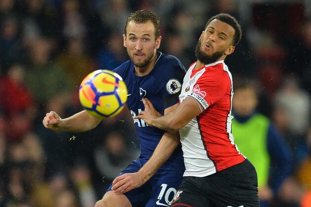 Tottenham Hotspur's English striker Harry Kane (L) vies with Southampton's English defender Ryan Bertrand during the English Premier League football match between Southampton and Tottenham Hotspur at St Mary's Stadium in Southampton, southern England on January 21, 2018. / AFP PHOTO / Glyn KIRK / RESTRICTED TO EDITORIAL USE. No use with unauthorized audio, video, data, fixture lists, club/league logos or 'live' services. Online in-match use limited to 75 images, no video emulation. No use in betting, games or single club/league/player publications.  /         (Photo credit should read GLYN KIRK/AFP/Getty Images)