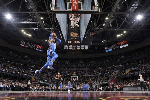 CLEVELAND, OH - JANUARY 20:  Russell Westbrook #0 of the Oklahoma City Thunder dunks against the Cleveland Cavaliers on January 20, 2018 at Quicken Loans Arena in Cleveland, Ohio. NOTE TO USER: User expressly acknowledges and agrees that, by downloading and/or using this Photograph, user is consenting to the terms and conditions of the Getty Images License Agreement. Mandatory Copyright Notice: Copyright 2018 NBAE  (Photo by David Liam Kyle/NBAE via Getty Images)