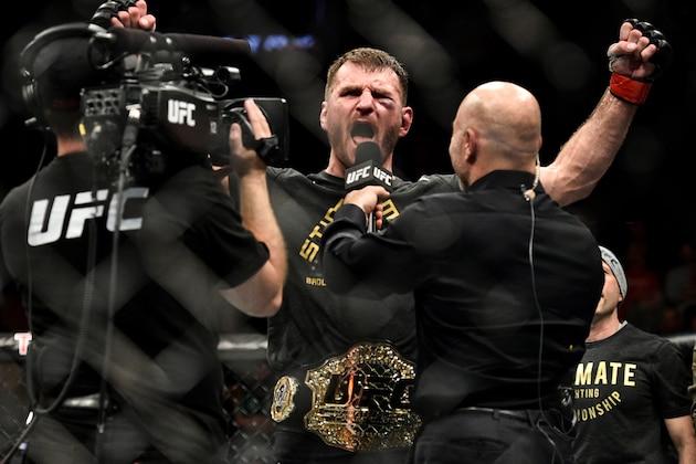 BOSTON, MA - JANUARY 20:  (R-L) Stipe Miocic celebrates his victory over Francis Ngannou of Cameroon in their heavyweight championship bout during the UFC 220 event at TD Garden on January 20, 2018 in Boston, Massachusetts. (Photo by Brandon Magnus/Zuffa LLC/Zuffa LLC via Getty Images)