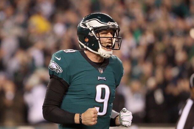 PHILADELPHIA, PA - JANUARY 21:  Nick Foles #9 of the Philadelphia Eagles celebrates a second quarter touchdown by teammate LeGarrette Blount (not pictured) against the Minnesota Vikings in the NFC Championship game at Lincoln Financial Field on January 21, 2018 in Philadelphia, Pennsylvania.  (Photo by Abbie Parr/Getty Images)
