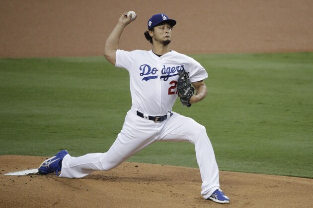FILE - In this Nov. 1, 2017, file photo, Los Angeles Dodgers starting pitcher Yu Darvish, of Japan, throws against the Houston Astros during the first inning of Game 7 of baseball's World Series in Los Angeles. Free agent pitcher Darvish said Monday, Dec. 18, he had a
