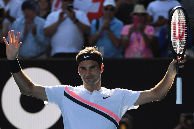 Switzerland's Roger Federer celebrates his win against Marton Fucsovics of Hungary during their men's singles fourth round match on day eight of the Australian Open tennis tournament in Melbourne on January 22, 2018. / AFP PHOTO / WILLIAM WEST / -- IMAGE RESTRICTED TO EDITORIAL USE - STRICTLY NO COMMERCIAL USE --        (Photo credit should read WILLIAM WEST/AFP/Getty Images)
