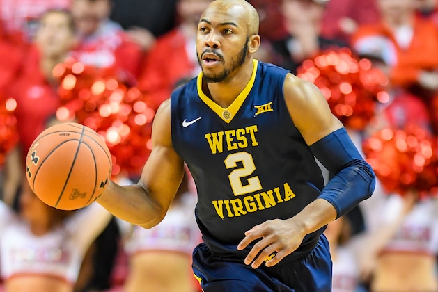 LUBBOCK, TX - JANUARY 13: Jevon Carter #2 of the West Virginia Mountaineers brings the ball up court during the game against the Texas Tech Red Raiders on January 13, 2018 at United Supermarket Arena in Lubbock, Texas. Texas Tech defeated West Virginia 72-71. (Photo by John Weast/Getty Images)