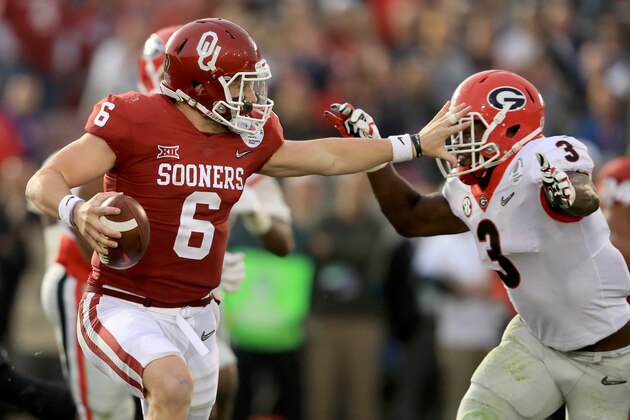 PASADENA, CA - JANUARY 01:  Quarterback Baker Mayfield #6 of the Oklahoma Sooners looks to avoid a sack by linebacker Roquan Smith #3 of the Georgia Bulldogs in the second half in the 2018 College Football Playoff Semifinal at the Rose Bowl Game presented by Northwestern Mutual at the Rose Bowl on January 1, 2018 in Pasadena, California.  (Photo by Sean M. Haffey/Getty Images)