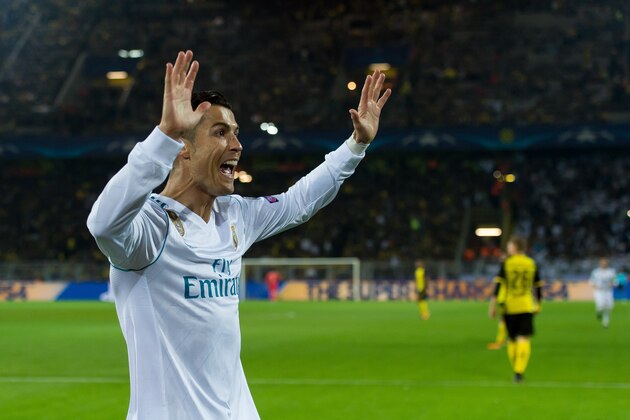 DORTMUND, GERMANY - SEPTEMBER 26: Cristiano Ronaldo of Real Madrid celebrate his goal during the UEFA Champions League group H match between Borussia Dortmund and Real Madrid at Signal Iduna Park on September 26, 2017 in Dortmund, Germany. (Photo by TF-Images/TF-Images via Getty Images)