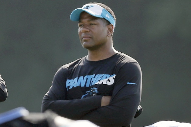 FILE - In this Aug. 3, 2015, file photo, Carolina Panthers assistant head coach Steve Wilks watches players warm up during NFL football team's training camp in Spartanburg, S.C. Wilks was the second coaching candidate the Tennessee Titans interviewed Thursday, Jan. 18, 2018,  as they kicked off their search for a new head coach. The Titans earlier interviewed Mike Vrabel, Houston's defensive coordinator. (AP Photo/Chuck Burton, File)