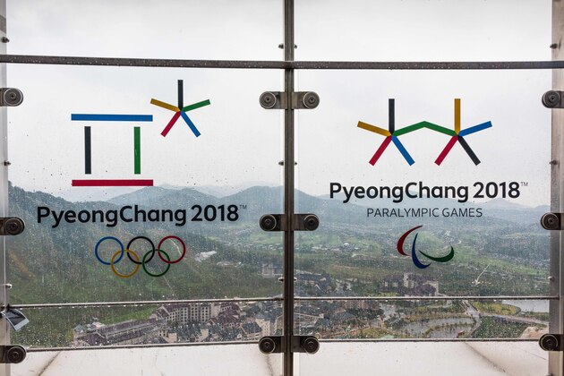 This picture taken on September 27, 2017 shows the Alpensia resort through a glass railing showing the logo of the Pyeongchang Winter Olympic Games in PyeongChang.
The PyeongChang Winter Olympic Games 2018 will take place from February 9, 2018 to February 25, 2018. / AFP PHOTO / Francois Xavier MARIT        (Photo credit should read FRANCOIS XAVIER MARIT/AFP/Getty Images)