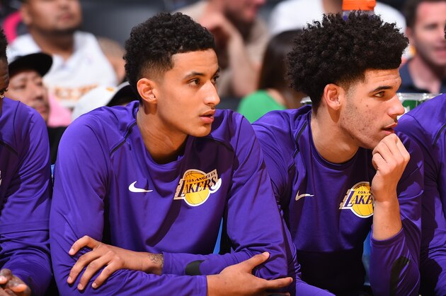 LOS ANGELES, CA - OCTOBER 10:  Jordan Clarkson #6, Lonzo Ball #2 and Josh Hart #5 of the Los Angeles Lakers react to a play during a preseason game against the Utah Jazz on October 10, 2017 at STAPLES Center in Los Angeles, California. NOTE TO USER: User expressly acknowledges and agrees that, by downloading and/or using this Photograph, user is consenting to the terms and conditions of the Getty Images License Agreement. Mandatory Copyright Notice: Copyright 2017 NBAE (Photo by Andrew D. Bernstein/NBAE via Getty Images)