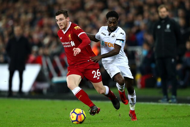 SWANSEA, WALES - JANUARY 22:  Andy Robertson of Liverpool and Nathan Dyer of Swansea City battle for possession during the Premier League match between Swansea City and Liverpool at Liberty Stadium on January 22, 2018 in Swansea, Wales.  (Photo by Michael Steele/Getty Images)