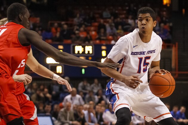 Boise State's Chandler Hutchison (15) moves the ball during the first half of an NCAA college basketball game against New Mexico in Boise, Idaho, on Tuesday, Feb. 24, 2015. Boise State won 76-65. (AP Photo/Otto Kitsinger)