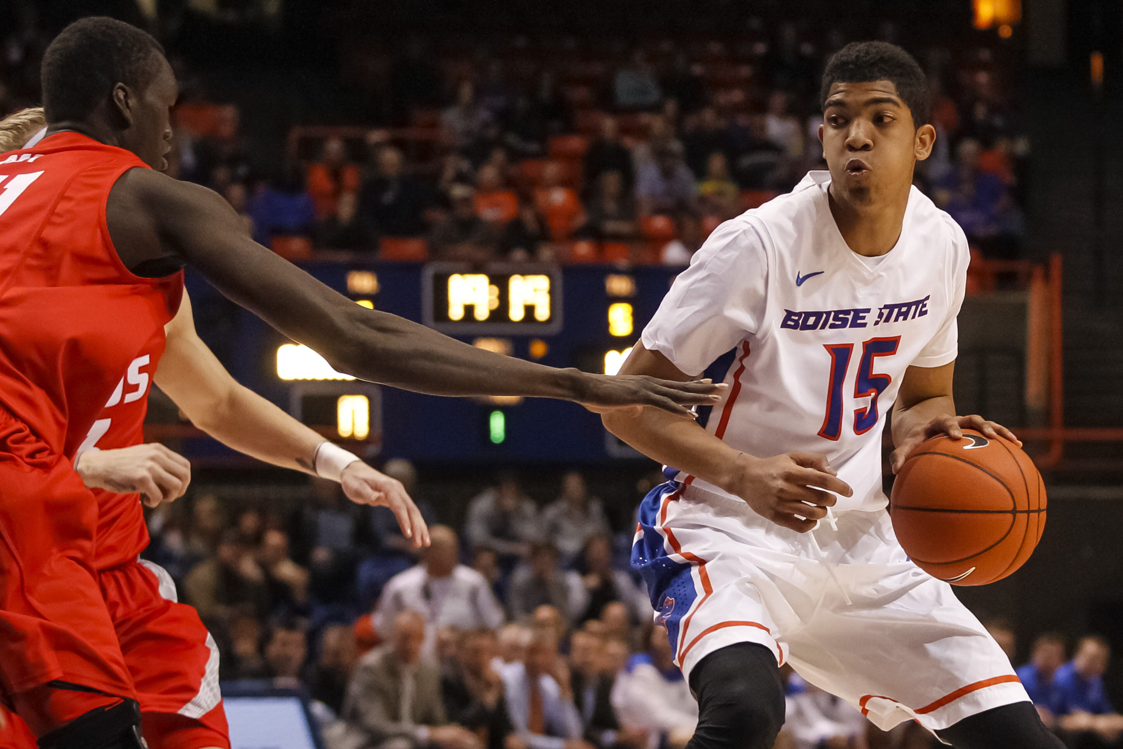 Boise State's Chandler Hutchison (15) moves the ball during the first half of an NCAA college basketball game against New Mexico in Boise, Idaho, on Tuesday, Feb. 24, 2015. Boise State won 76-65. (AP Photo/Otto Kitsinger)