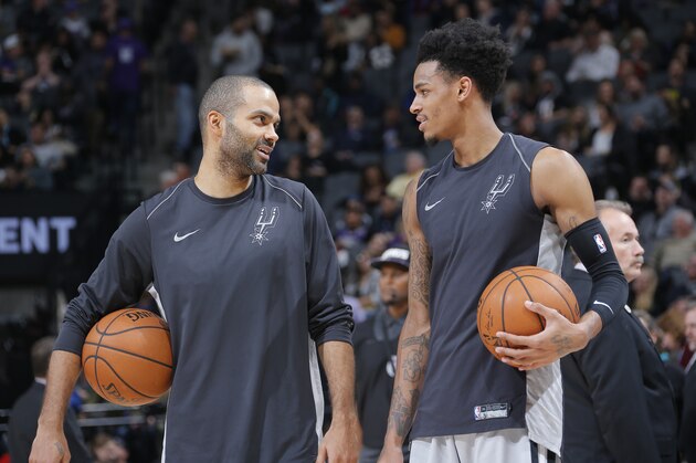 SACRAMENTO, CA - DECEMBER 23: Tony Parker #9 and Dejounte Murray #5 of the San Antonio Spurs warm up against the Sacramento Kings on December 23, 2017 at Golden 1 Center in Sacramento, California. NOTE TO USER: User expressly acknowledges and agrees that, by downloading and or using this photograph, User is consenting to the terms and conditions of the Getty Images Agreement. Mandatory Copyright Notice: Copyright 2017 NBAE (Photo by Rocky Widner/NBAE via Getty Images)
