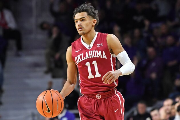 MANHATTAN, KS - JANUARY 16:  Trae Young #11 of the Oklahoma Sooners brings the ball up court against the Kansas State Wildcats during the first half on January 16, 2018 at Bramlage Coliseum in Manhattan, Kansas.  (Photo by Peter G. Aiken/Getty Images)